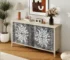 Modern rustic wooden buffet cabinet with four doors and adjustable shelves in a living room
