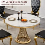 47-inch round marble dining table with stainless steel base in a modern luxury dining room setting