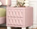 Modern solid wood nightstand with two drawers in a bedroom setting