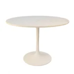White marble round dining table 40 inch with iron pedestal base in a modern dining room setting