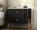 Modern 2 drawer nightstand in bedroom with lamp and decor