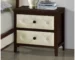 Cherry espresso nightstand with tufted linen front and two drawers in a bedroom