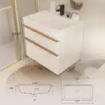 Solid wood bathroom vanity in white, 30 inch, angled view showing sleek handle and countertop.