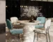 Goldoma modern round wood pedestal small dining table for 4 in a cozy dining room