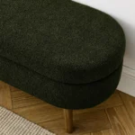 Green oval storage ottoman bench with rubber wood legs and lid open showing interior storage space