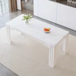 Modern white MDF dining table with grooved legs in a bright dining room setting
