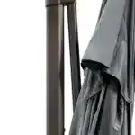 Dark gray rectangular tilt cantilever patio umbrella with stand in outdoor setting