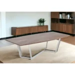 107 inch rectangular dining table with walnut top and silver iron trestle base in a dining room