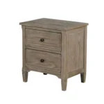 Wire brushed warm gray nightstand with two drawers and round knobs in a bedroom setting