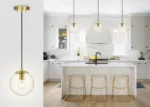 Pendant light shown from below, revealing the bulb inside the clear glass ball.