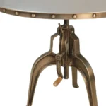 Adjustable height round dining table with antiqued nickel three-leg pedestal base and rivet detailing