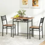 Rustic brown dining table set with two chairs and a storage shelf underneath in a modern industrial style