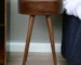 Nordic Chestnut circular solid wood nightstand with drawer in bedroom setting