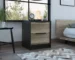 Black nightstand with drawers in a modern bedroom setting