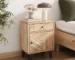 Solid wood nightstand with drawer and door in Scandinavian bedroom setting