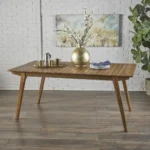 69-inch solid wood outdoor dining table on a patio with chairs