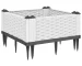 White polypropylene garden planter set of modular flower pots arranged on a wooden deck.