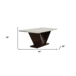 Close-up of Goldoma 64 inch white and dark brown marble pedestal dining table, showcasing the genuine marble top and V-shaped wood base.