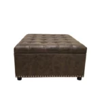 Goldoma modern black square storage ottoman with button tufting and wooden legs in a living room setting