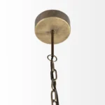 Side view of the stylish black hanging light with geometric globe shade, against a plain light wall.