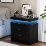 Modern LED nightstand with three drawers and blue glow in bedroom setting
