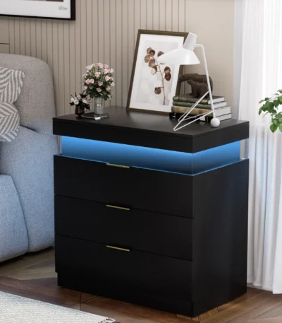 Modern LED nightstand with three drawers and blue glow in bedroom setting