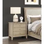 Classic farmhouse nightstand in beige wood finish with three drawers - Goldoma