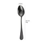 Elegant gold flatware set with fork, knife, and spoon on a white tablecloth