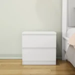 White nightstand with 2 drawers and handle-free design featuring a thickened top plate in a modern bedroom setting