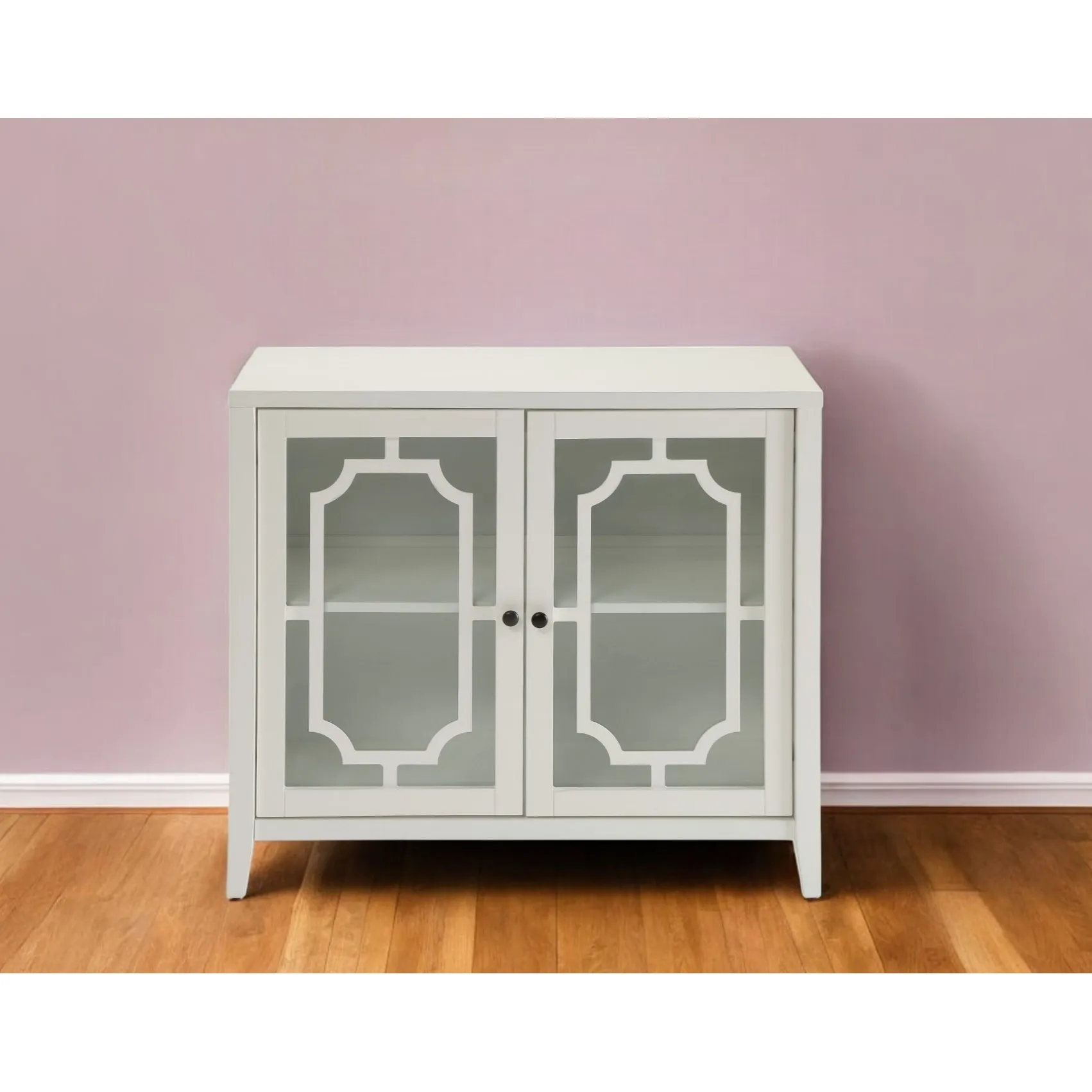 Black sideboard with glass doors in a modern dining room featuring antique solid wood finish