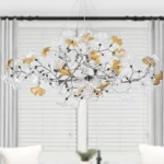Modern black rectangle chandelier with ginkgo leaves in a dining room
