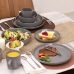 Super September Bestseller Nordic-style Round Stone Tool Tableware Set 20 Matte Light Grey Plates and Bowls – styled in a