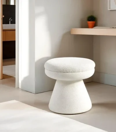 Adjustable velvet mushroom ottoman in a modern living room setting, plush round seat with wooden legs