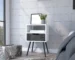 Smokey oak nightstand with one drawer and one shelf in a modern bedroom