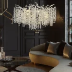 Modern crystal chandelier with K9 crystals illuminating a dining room