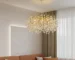 Luxury crystal chandelier illuminating a grand hotel lobby with sparkling K9 crystals