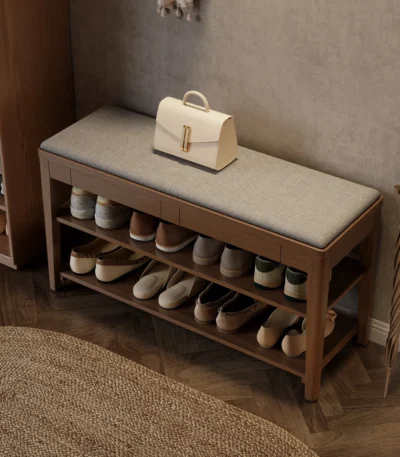 Mid-century shoe storage bench with memory foam cushion and hidden drawer in natural wood finish
