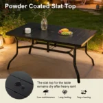 Black patio dining table with umbrella hole and anti-slip pads on a garden patio