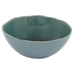 Eco-friendly green dinnerware set with plates and cups on a wooden table