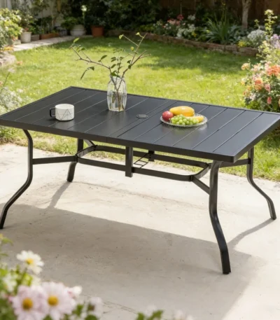 Black patio dining table with umbrella hole and anti-slip pads on a garden patio