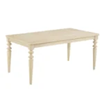 Urban style wired white dining table with turned legs and wood grain finish in a modern home setting