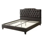 Modern faux leather queen bed with tufted upholstered headboard in a stylish bedroom setting