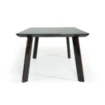Goldoma 87" black and rose gold rectangular dining table with high-gloss finish in a modern dining room setting