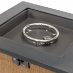 Outdoor gas fire pit column with dancing flames on a patio