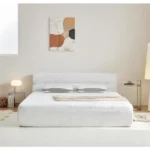 Modern all-in-one bed frame with box spring in cool-touch fabric, featuring motion isolation for undisturbed sleep