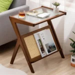 Boho rattan nightstand with glass top and bamboo accents, featuring a woven storage shelf, ideal for bedside or small spaces.