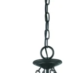 HMS Belle 3-light modern hanging light illuminating a cozy living area with warm ambient glow.
