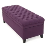Purple fabric storage ottoman with hidden compartment and birch wood legs in a living room