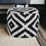 Black and white geometric pouf ottoman with storage, foldable foot stool by Goldoma