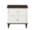 Goldoma Carena white and brown nightstand with USB ports next to a bed